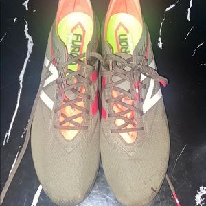 Size 12 SG New balance soccer cleats . Worn once
